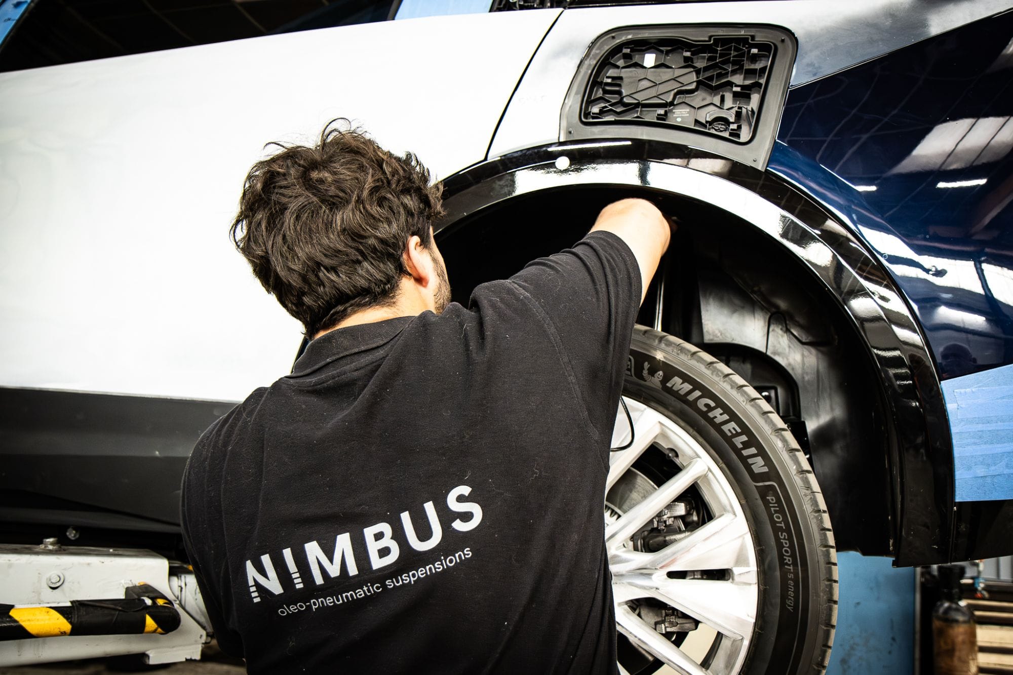 Nimbus technician working on a rear wheel arch